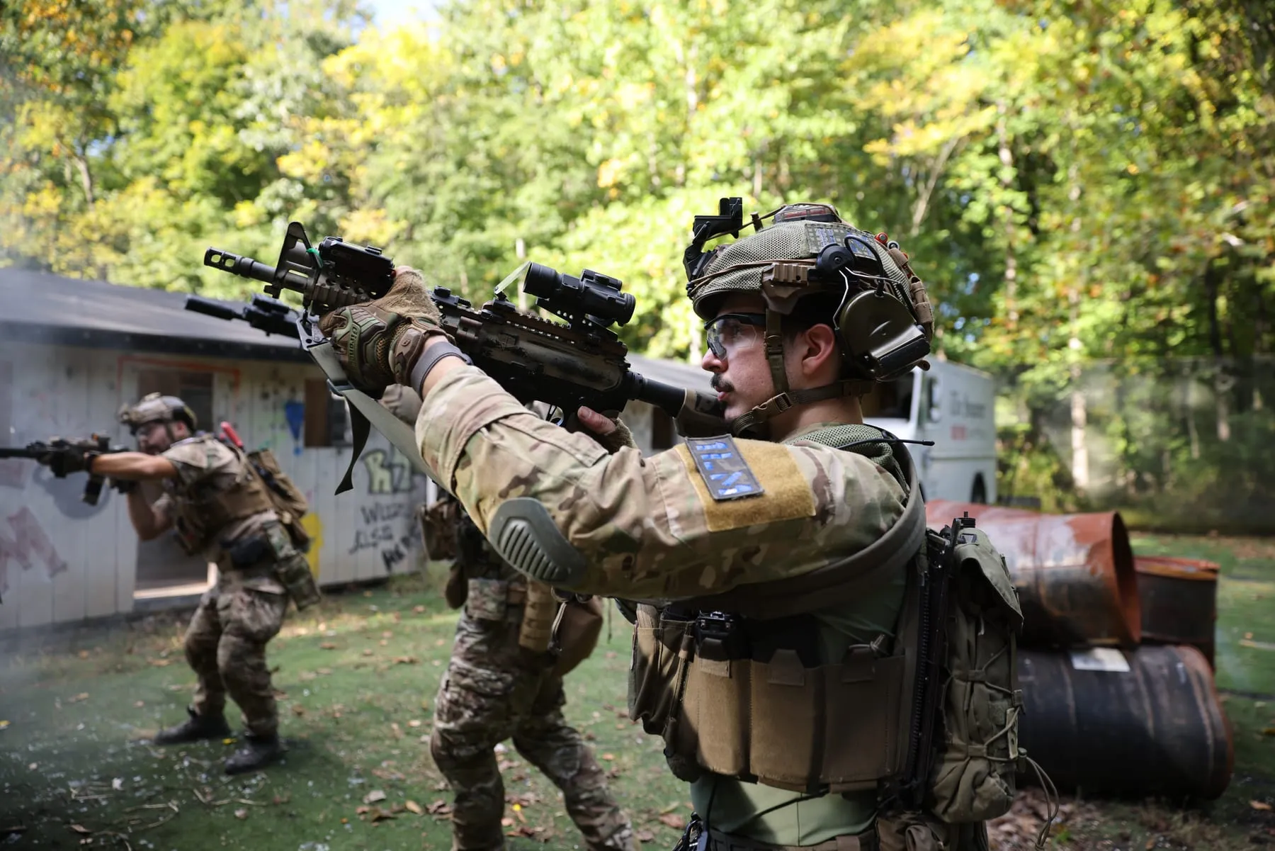 Team firing across an open field